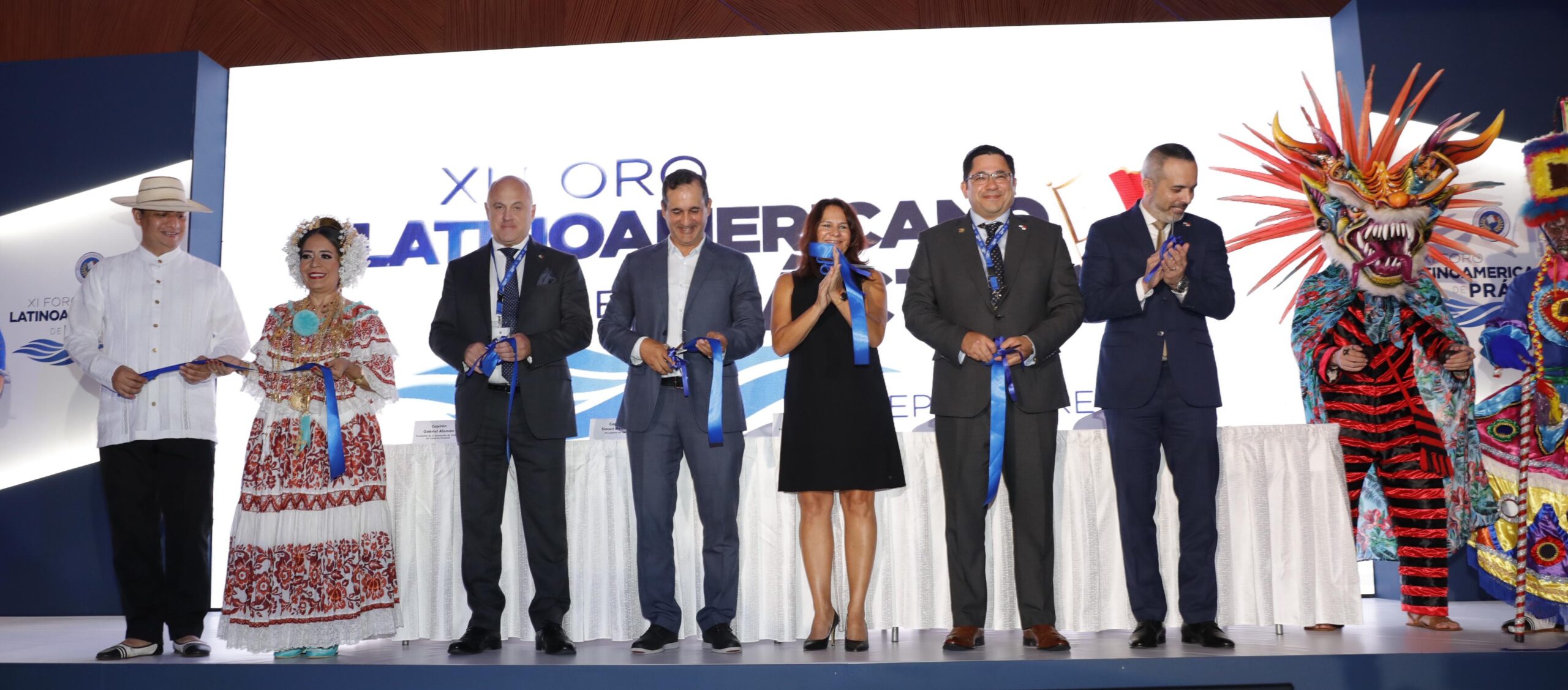 En la inauguración: Simon Pelletier, Presidente De La Asociación Internacional De Pilotos Marítimos (IMPA, siglas en Inglés); Capitán Gabriel Alemán, Presidente de la Asociación de Prácticos del Canal De Panamá; Ing. Ilya Espino De Marotta, Sub Administradora del Canal de Panamá; Su Excelencia Luis Bernal, Embajador De Panamá Ante La Organización Marítima Internacional y el Cap. Juan Maltez, Director de Gente de Mar, de la Autoridad Marítima de Panamá.